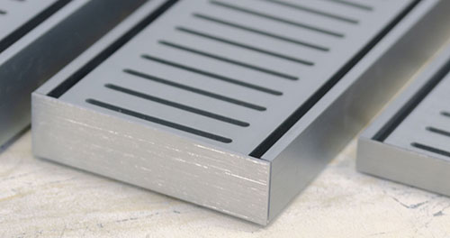 NXT range of linear grates from Lauxes Grates International